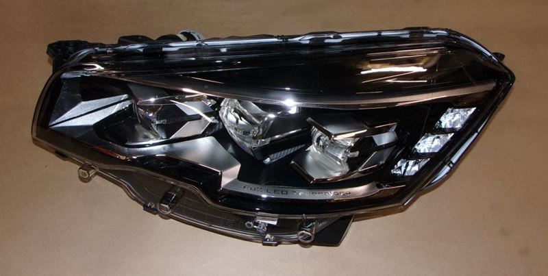 Reflektor Peugeot 508 lewy