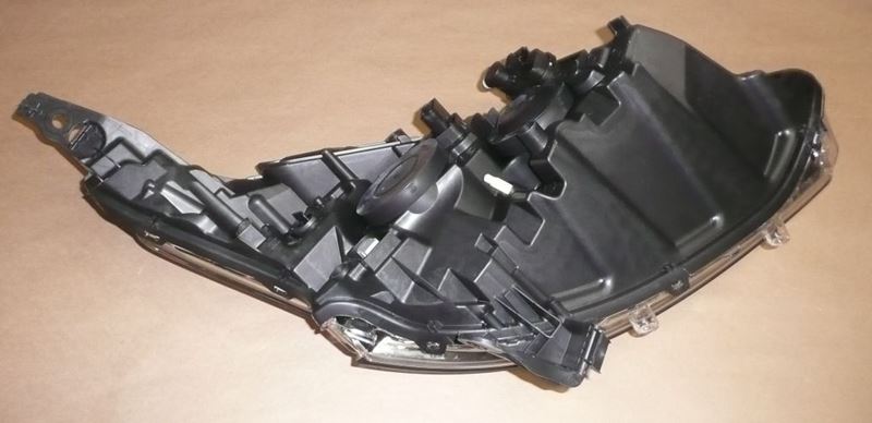 Reflektor Peugeot 208 lewy