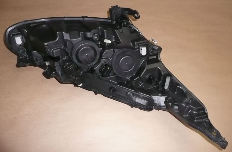 Reflektor Peugeot 208 lewy