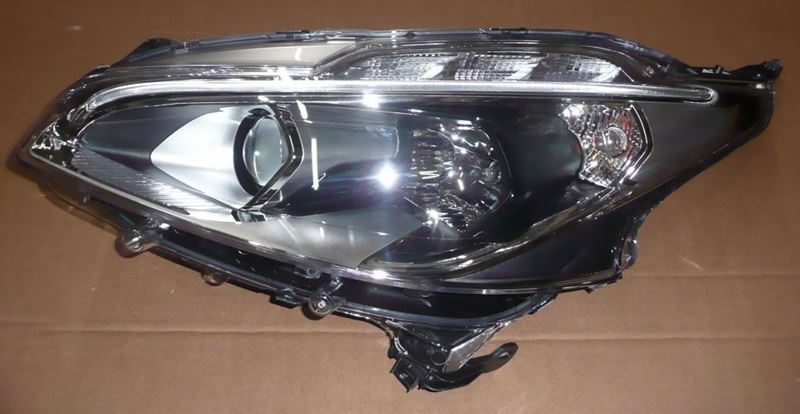 Reflektor Peugeot 208 lewy
