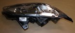 Reflektor Renault Laguna III prawy chrom