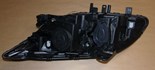 Reflektor Renault Laguna III prawy chrom