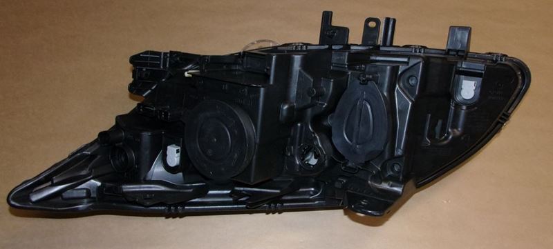 Reflektor Renault Laguna III prawy chrom