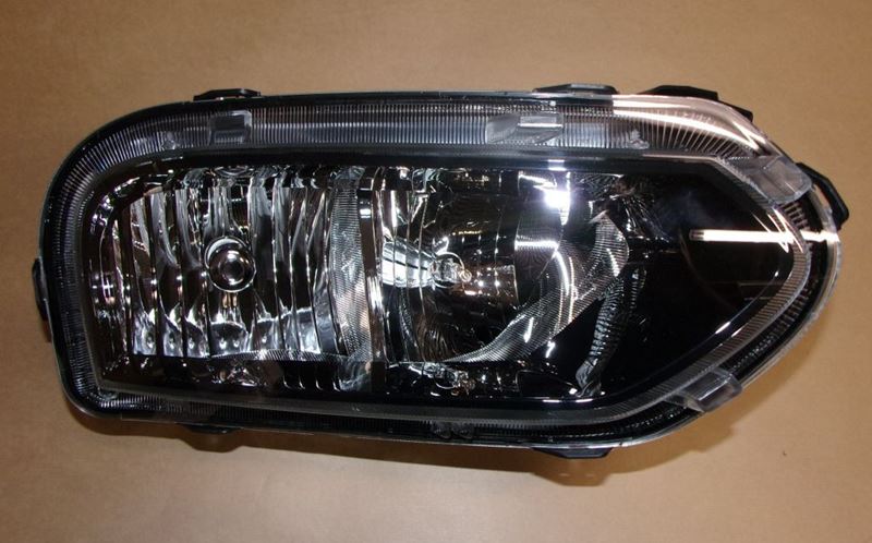 Reflektor Dacia Spring prawy