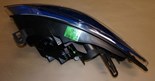 Reflektor Renault Fluence prawy chrom