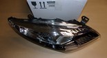 Reflektor Renault Fluence prawy czarny