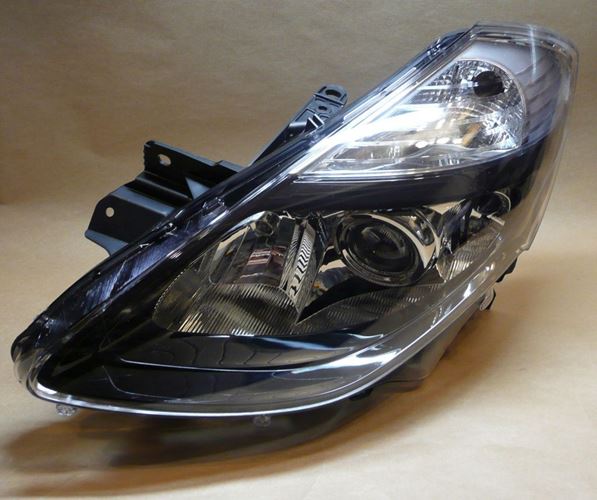 Reflektor Renault Clio III lewy przyciemniany