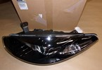 Reflektor Renault Fluence lewy