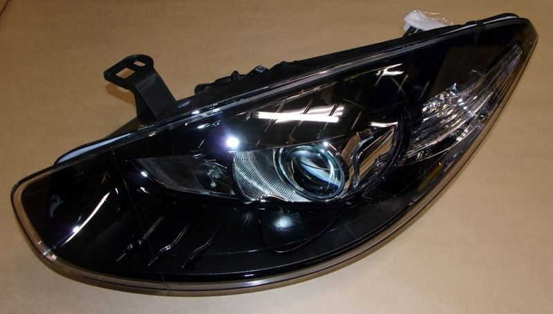 Reflektor Renault Fluence lewy