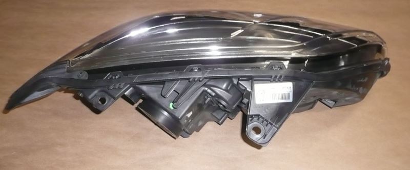 Reflektor Renault Laguna III lewy