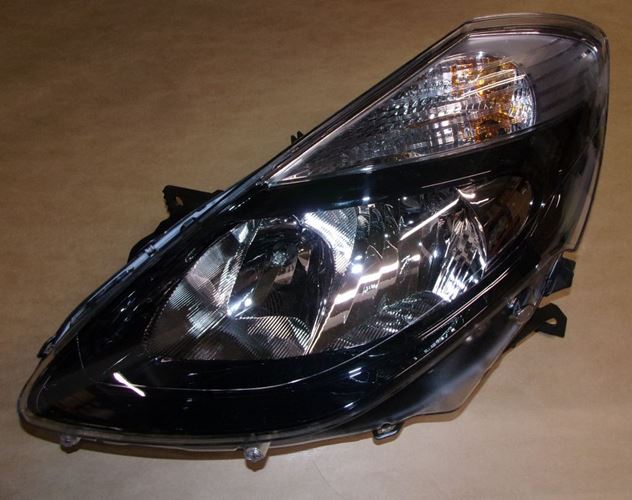 Reflektor Renault Clio III czarny lewy