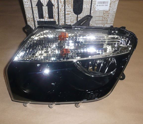 Reflektor Dacia Duster lewy