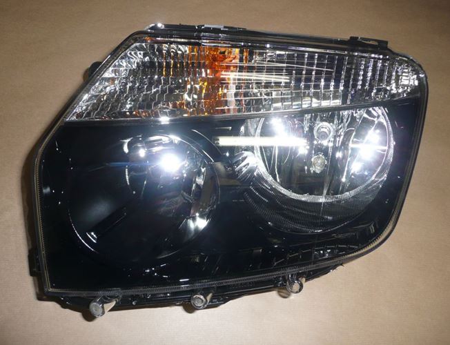Reflektor Dacia Duster lewy