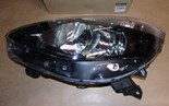Reflektor Renault Clio III czarny lift lewy
