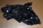 Reflektor Renault Clio III czarny lift lewy