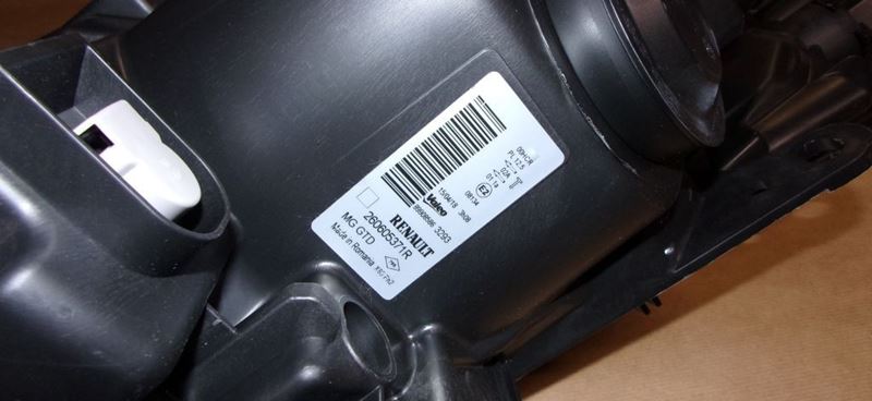 Reflektor Renault Clio III czarny lift lewy