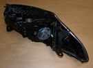 Reflektor Renault Megane III Coupe lewy