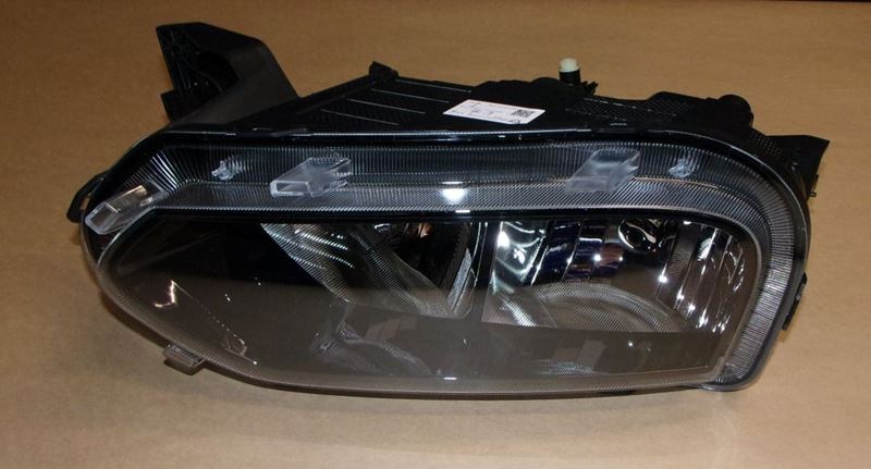 Reflektor Dacia Spring lewy