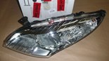Reflektor Renault Megane III lewy