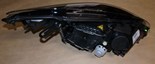 Reflektor Renault Megane III lewy Xenon czarny