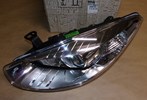 Reflektor Renault Fluence lewy