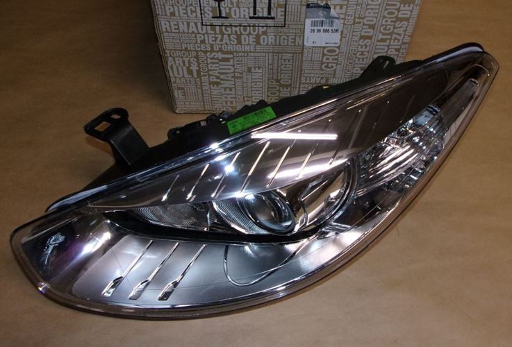 Reflektor Renault Fluence lewy