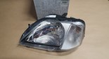 Reflektor Dacia Logan lewa