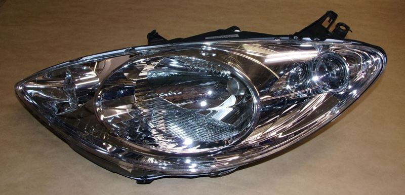 Reflektor Peugeot 1007 lewy