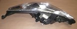 Reflektor Peugeot 207 lewy