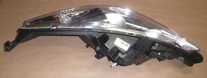 Reflektor Peugeot 207 lewy