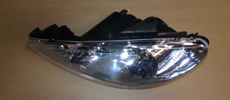Reflektor Peugeot 206 lewy