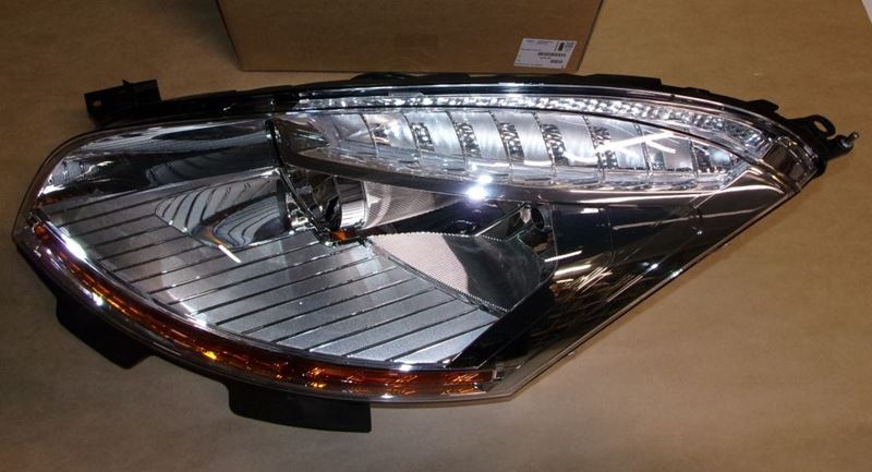 Reflektor Citroen C4 Picasso I lewy