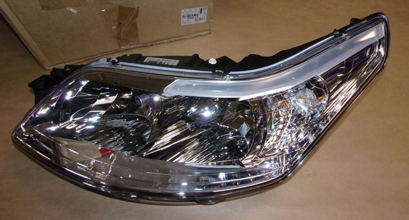 Reflektor Citroen C4 lewy