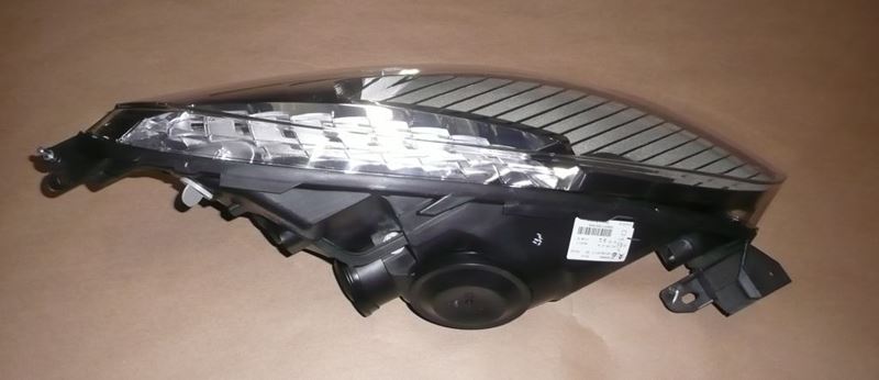Reflektor Citroen C4 Picasso lewy