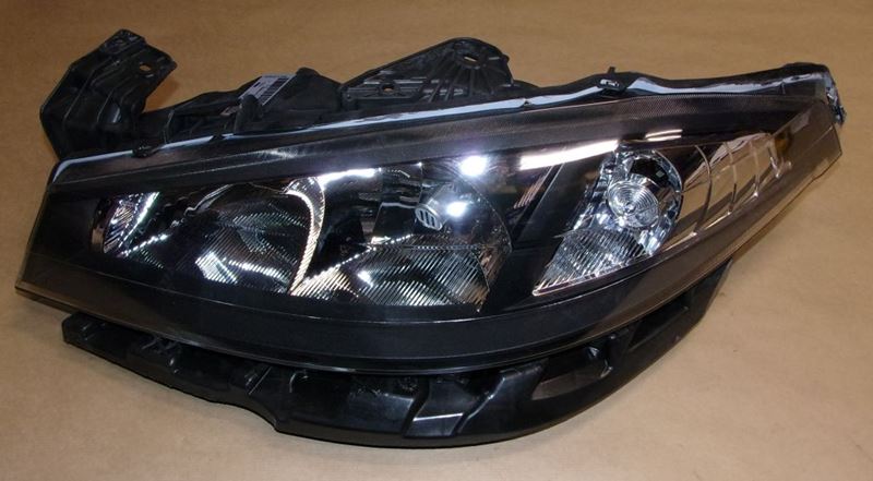 Reflektor Renault Laguna II lewy lift 05-08