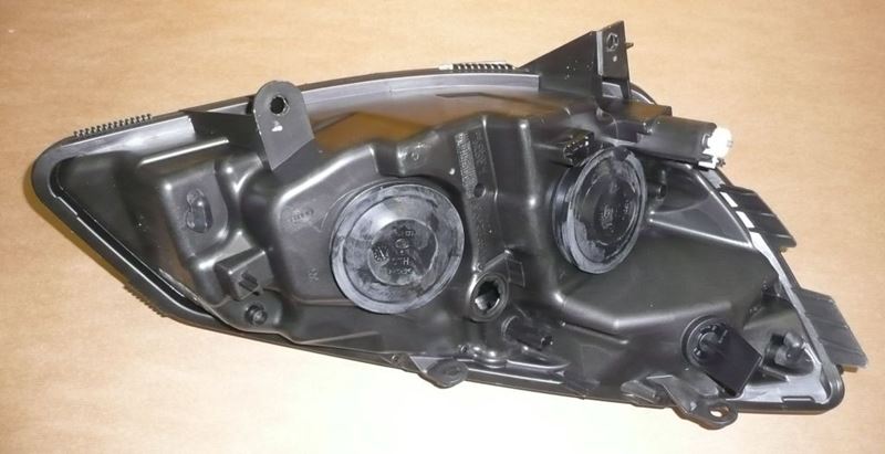 Reflektor Renault Scenic II 03-08 lewy